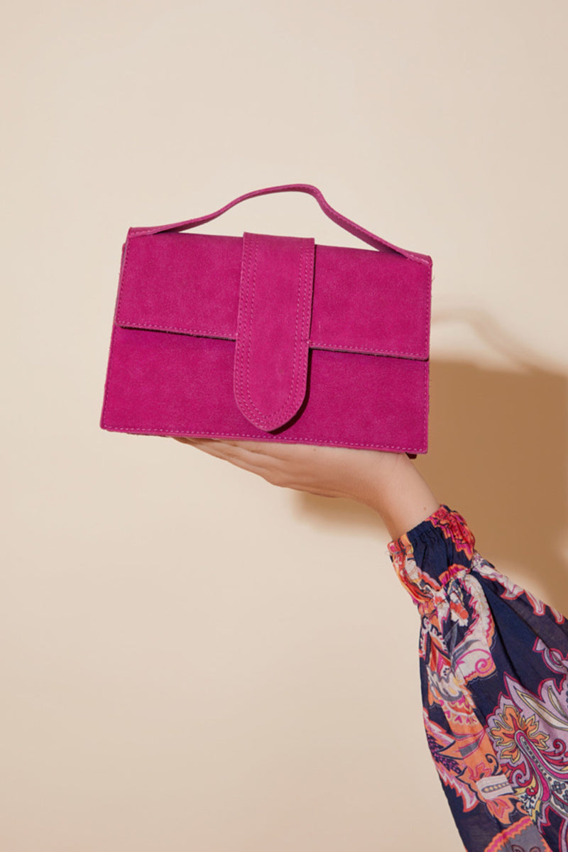 Fuschia pink hotsell suede clutch bag