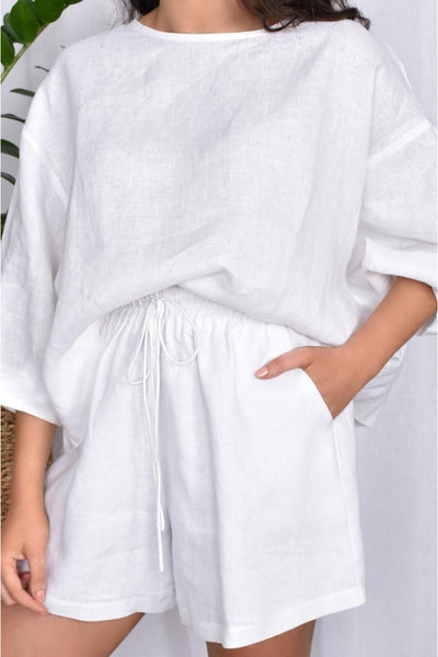 Buy Adorne Billy Linen Shorts in White. Mid Length White Linen Shorts with Drawstring Waist and Matching Linen Top.