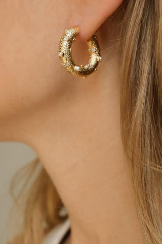 Jolie and Deen Logan Hoop Earrings are a statement textured mid sized gold hoop with pearl and crystal detail.